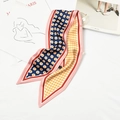 Polka dot skinny silk scarf in blue and yellow with pink stripes on white desk - Double-Sided Dots Pink Edge