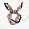 Elegant silk-style neck scarf in dusty rose and cream with chain pattern knot detail - Chain Grid Coffee
