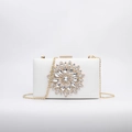 White hard shell evening clutch bag with sparkling rhinestone flower and gold chain - White