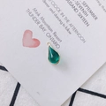 Macro shot of green teardrop pendant with gold rim and rhinestone detail - 3# Green