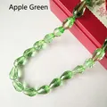 Macro shot of faceted apple green waterdrop glass beads for DIY jewelry making accessories - 4*6mm / Apple Green