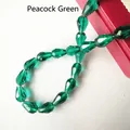 Faceted peacock green teardrop glass beads for DIY jewelry making and accessories - 4*6mm / Malachite green