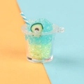 Close-up of DIY resin beverage keychain with avocado charm and blue striped straw - Blue