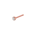 Macro shot of rose gold nose stud with a clear round bezel-set cubic zirconia stone - Rose Gold Straight Point Drill