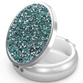 Macro shot of circular metal pill box interior with two compartments and teal rhinestones - Silver - Silver Green Rhinestone