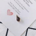 Deep brown teardrop rhinestone pendant with golden metal frame on decorative paper - Dark Grey