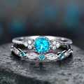 Exquisite two-piece silver ring set with round blue gemstone and micro-pave cubic zirconia - Lake Blue