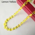 Macro shot of faceted lemon yellow teardrop glass beads for DIY jewelry making accessories - 4*6mm / Lemon Yellow