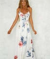 Detail of V-neck white maxi dress with red floral print and adjustable front ties - S / Dresses / White