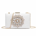 White hardshell evening clutch with radiant rhinestone floral pattern and gold chain - White