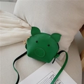 Green pig-shaped kids crossbody bag in PU leather with gold flower charm and strap - Green
