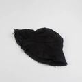 Detailed close-up of the raw fringe edge and cotton texture on the black bucket hat - M (56-58cm) / Black