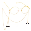 Cadena dorada para gafas con colgantes negros en montura metálica redonda estilo vintage - Cadena de metal dorado con dije de gafas de sol negras