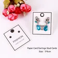 Aquamarine water-drop stud earrings with crystal heart accents on 5x6cm fashion card - EA-ZK084 5x6cm Panda Display Card