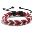 Handmade woven couple bracelet featuring red and white wax cord with adjustable black pull string - Red + White