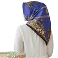 Detail of royal blue silk scarf with gold chain and leopard print in a head wrap style - #27 Blue Leopard
