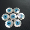Natural mother of pearl evil eye beads with blue center on black textured background - 10mm / No Hole
