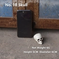 Miniature ivory skull model No.10, 5x6cm size, shown next to a phone for scale - Egg-Shaped Mini Skull (New No. 17)