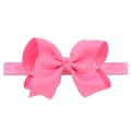 Detail of hot pink ribbed grosgrain bow on high elasticity headband for children - Hot Pink
