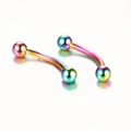 Close-up of two rainbow PVD curved barbells for eyebrow and lip piercings on white background - Sphere / 1.2*6+3mm / Colorful