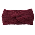 Deep red knitted twist headband for women, thick handmade winter ear warmer in wine red color - Fuschia