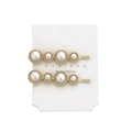 Detail showing two gold pearl hair clips with alternating beads on a display card - Half Round Multi-sized Pearls