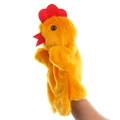 Macro detail of hand wearing a soft yellow plush chicken hand puppet for storytelling - Hen