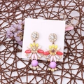 Detail view of Bohemian colorful flower earrings displayed on a white jewelry card - EA-ZK025 8x8cm NYU Made in Korea