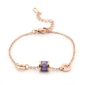 Bracelet en acier titane or rose avec pierre violette et breloques chiffres romains - Violet