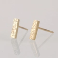 Minimalist long gold bar stud earrings with hammered metal texture for a modern look - Gold