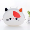 White silicone mini coin purse featuring a cute cartoon cat face with a metal clasp - Calico Cat