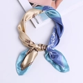 Blue and gold paisley print satin square scarf styled in a soft ring knot on a white surface - Sky Blue Four-Panel Paisley