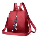 Minimalist burgundy waterproof nylon backpack for women with cute cat charm pendant - Red