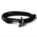 Détail macro du bracelet en nylon tressé noir avec fermoir ancre poli brillant - Corde Noire