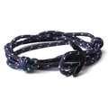 Macro detail of navy braided rope bracelet with black anchor clasp on white background - BB12 Dark Blue Patchwork