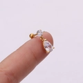 Detailed view of a gold flower pendant cartilage stud earring with pear shaped zircon - Round Plus Pear Drop Pendant (Gold 5#)