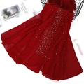 Close-up of deep red chiffon scarf fabric with delicate white pearl and rhinestone detailing - Red
