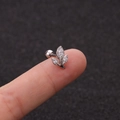 Detail view of leaf shaped zirconia stud earring with screw ball back held on a fingertip - Delicate Single Leaf Zirconia Style (HSPJ1915-15#)