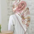 Pink and gold patterned silk square scarf worn as a bawal hijab on female model - #36 Grey Pink Chain