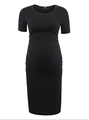 Short sleeve maternity dress in black featuring ruched side details for a growing belly - S / Black