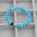 Detailed shot of blue cat eye stone beads and silver micro-set CZ crown on men's bracelet - Lake Blue