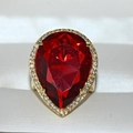 Luxury gold ring featuring a pear-cut red crystal surrounded by clear stones - US 6 / Red Zirconia