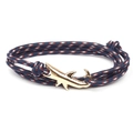 Close-up of golden shark buckle on navy blue and red braided rope wrap bracelet - GSY-10 Navy Mixed Color Rope + Gold Shark Hook