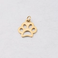 Golden stainless steel hollow dog paw pendant with jump ring on marble background - Gold With Ring