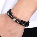 Ensemble de bracelets tête de mort avec pierres noires mates et détails en or rose - Or rose