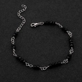 Bracciale geometrico in acciaio al titanio fatto a mano con perle di cristallo nero - Bracciale