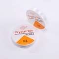 Detail of 0.6mm transparent elastic beaded thread by Crystal Tec for DIY jewelry making - 0.6mm