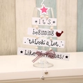 Wooden Christmas tree wall decor with red star, bird and bell in white and natural wood - White