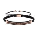 Detail of rose gold bar bracelet with double-row micro-set black stones on black woven cord - Rose Gold Bar