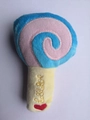 Detailed view of plush lollipop dog toy featuring soft blue fabric and Lollipop embroidery - Blue Lollipop